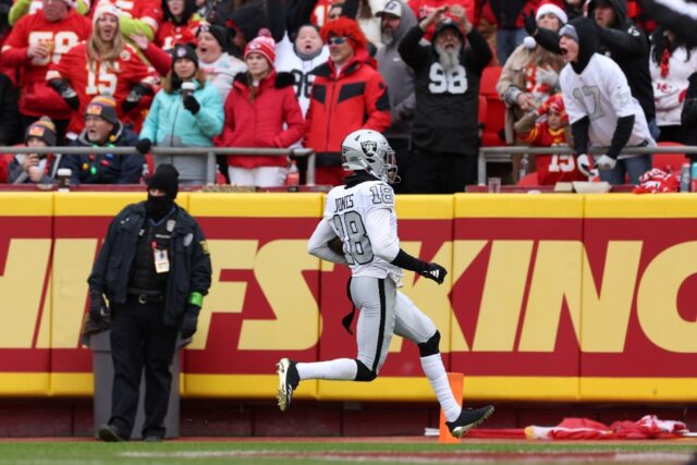 Jack Jones of the Las Vegas Raiders returns an interception for a touchdown in the Raiders