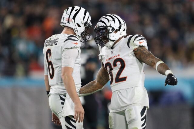 Jake Browning and Trayveon Williams of the Cincinnati Bengals celebrate a touchdown agains