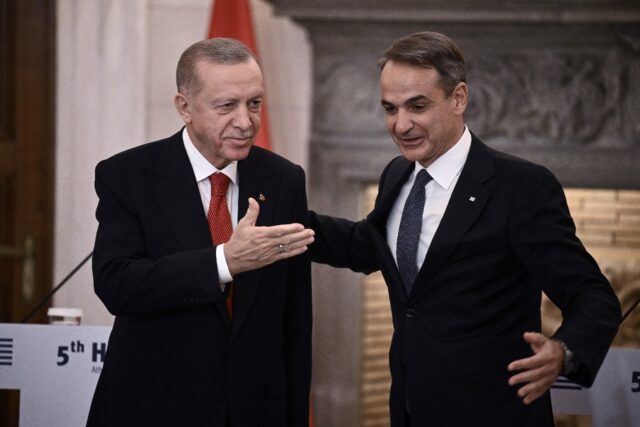 President Recep Tayyip Erdogan, left, and Greek Prime Minister Kyriakos Mitsotakis during