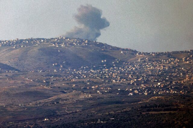 Smoke billows along hills in southern Lebanon after Israeli bombardment from a position al