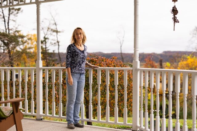 Point Township resident Annmarie Weber stands on the porch of her Pennsylvania home which