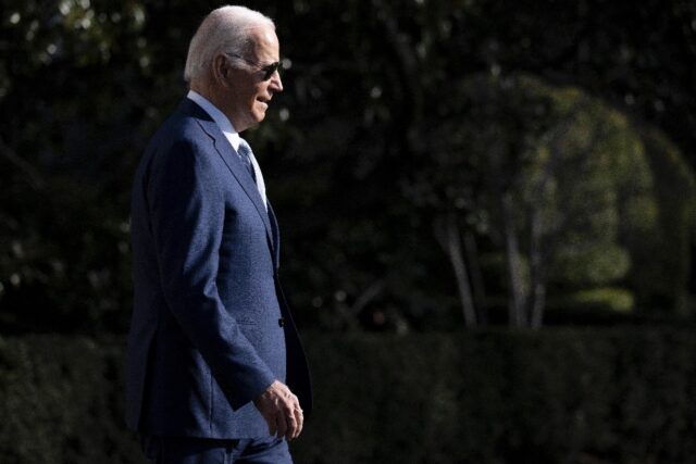 US President Joe Biden walks to board Marine One on the South Lawn of the White House