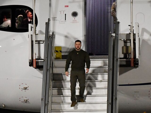 Ukraine's President Volodymyr Zelensky disembarks from a plane as he arrives at Orly airpo