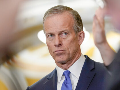 Senate Republican Whip John Thune, R-S.D., listens during a news conference after a policy