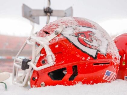 KANSAS CITY, MO - DECEMBER 15: Snow covers the helmets of Kansas City Chiefs players durin