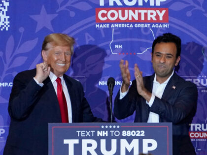 US entrepreneur Vivek Ramaswamy (R) endorses Republican presidential candidate former US P