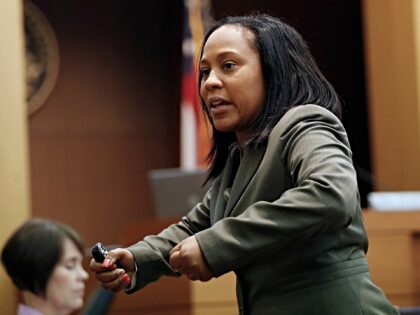 Fulton County deputy district attorney Fani Willis gestures as she makes her closing argum