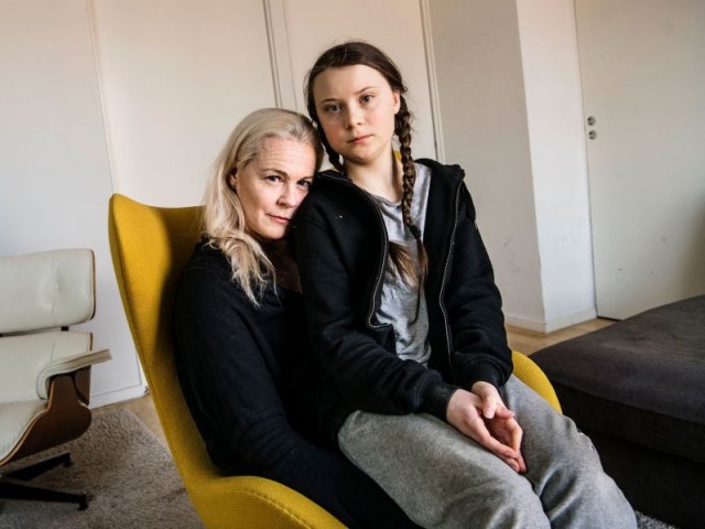 Greta Thunberg (R), 15, poses with her mother, opera singer Malena Ernman, in Stockholm, April 17, 2018. (Photo by various sources / AFP) / Sweden OUT (Photo by -/TT NEWS AGENCY/AFP via Getty Images)