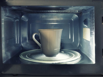 At home still life - A cup inside a microwave