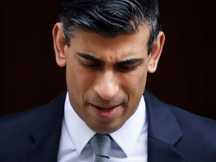 Britain's Chancellor of the Exchequer Rishi Sunak reacts as he leaves the 11 Downing Stree