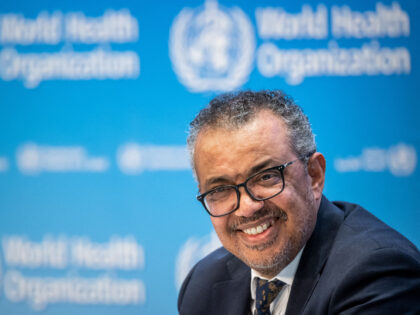 WHO Director-General Tedros Adhanom Ghebreyesus looks on during a press conference at the