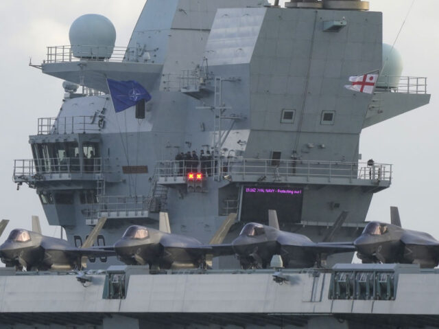 F35b jets line the deck of HMS Queen Elizabeth, as the Royal Navy aircraft carrier leaves