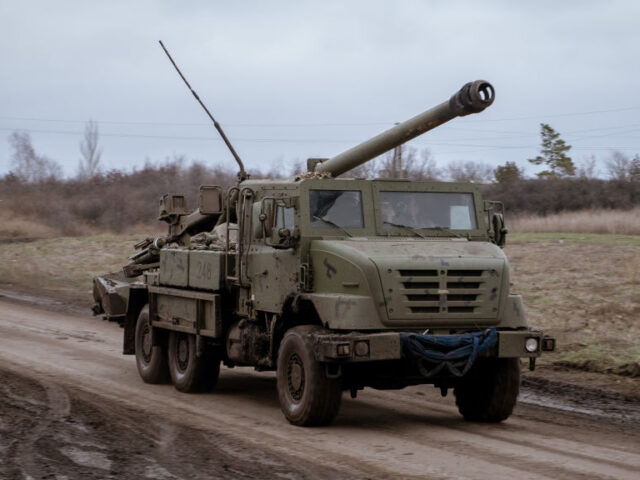 AVDIIVKA, UKRAINE - DECEMBER 4: French CAESAR Mk1, 155mm truck-mounted howitzer passing No