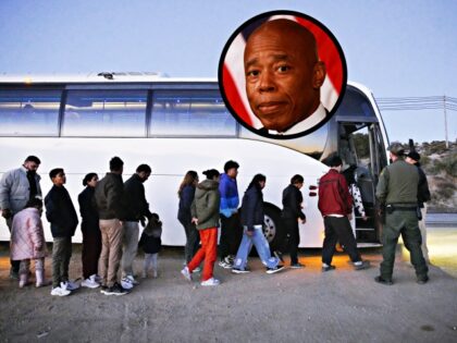 JACUMBA HOT SPRINGS, CALIFORNIA - DECEMBER 13: Migrants board a CBP transport bus, after c