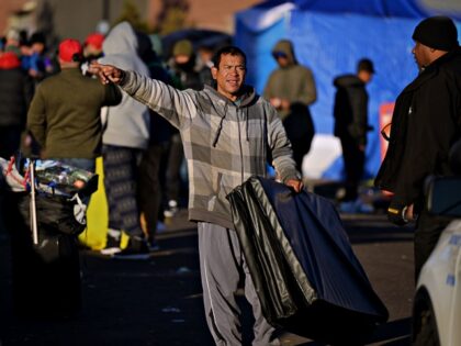 DENVER, CO - JANUARY 3 : People pack and prepare to leave the largest migrant encampment o