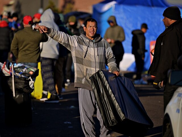 DENVER, CO - JANUARY 3 : People pack and prepare to leave the largest migrant encampment on 27th Ave. between Zuni St. and Alcott St. in Denver, Colorado on Wednesday, January 3, 2024. The City Council has allocated $300,000 for migrant families from this campsite to help cover their first …