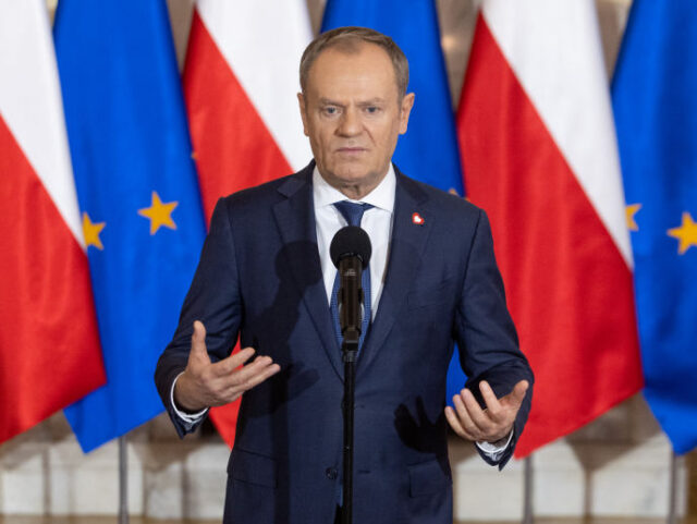 Polish Prime Minister Donald Tusk is speaking during a press conference after a government