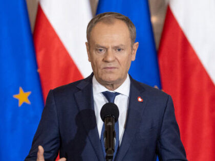 Polish Prime Minister Donald Tusk is speaking during a press conference after a government