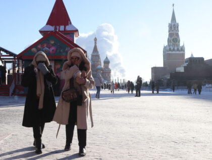 MOSCOW, RUSSIA - JANUARY 8: (RUSSIA OUT) Women walk along the Red Square near the Kremlin