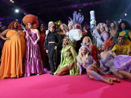 Attendees pose for a photograph during RuPaul's DragCon UK 2024 Drag Queen convention