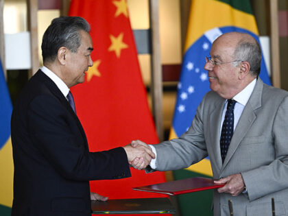 Chinese Foreign Minister, Wang Yi (L) meets with Brazilian Foreign Minister Mauro Vieira (