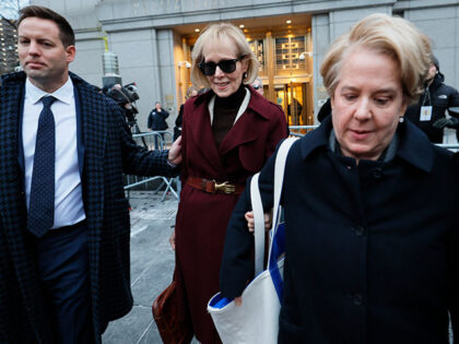 E. Jean Carroll (C) leaves Manhattan Federal Court on January 18, 2024 in New York City. C