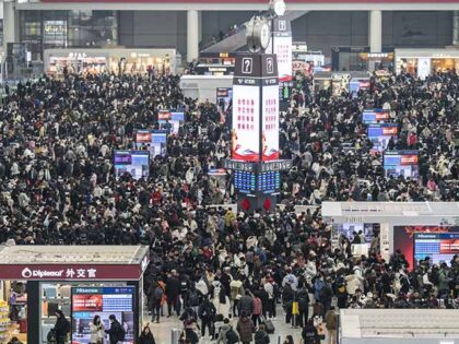 Travelers at the Hongqiao High-Speed Railway Station ahead of the Lunar New Year holiday i
