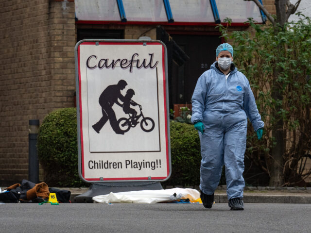 SOUTHWARK, ENGLAND - JANUARY 30: Police and forensics officers work at the scene of a shoo