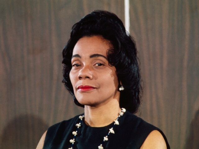(Original Caption) Mrs. Coretta Scott King, the widow of Dr. Martin Luther King is shown here during a press conference with Republican John Conyers, Jr. (Bettmann/Getty Images)