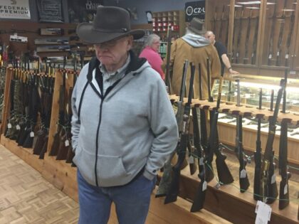 Retired computer programmer and firearms enthusiast Cephas Wright peruses the wares at The