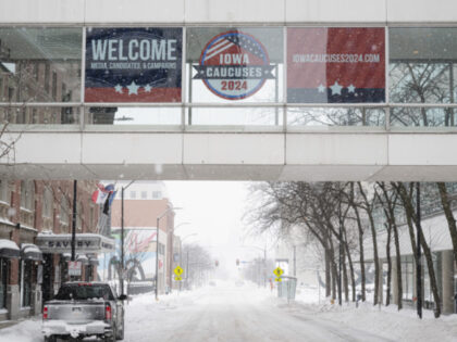 Signage ahead of the Iowa caucus in Des Moines, Iowa, US, on Friday, Jan. 12, 2024. The po