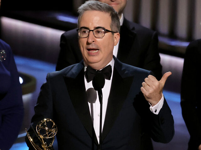 LOS ANGELES, CALIFORNIA - JANUARY 15: John Oliver accepts the Outstanding Scripted Variety