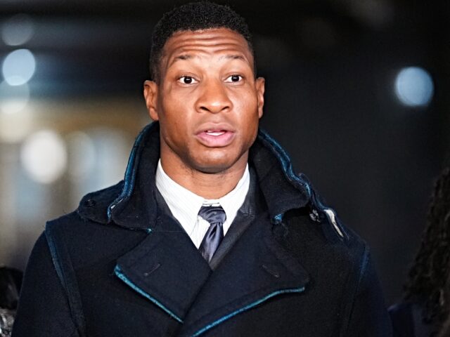 NEW YORK, NEW YORK - DECEMBER 15: Actor Jonathan Majors leaves the courthouse following closing arguments in Majors' domestic violence trial at Manhattan Criminal Court on December 15, 2023 in New York City. Majors had plead not guilty but faces up to a year in jail if convicted on misdemeanor …