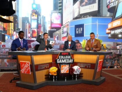 Lee Corso, Kirk Herbstreit, Chris Fowler are seen during ESPN's College GameDay show
