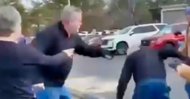 WATCH: Titans Fans Brawl in Wild Parking Lot Fight