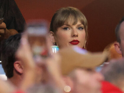 KANSAS CITY, MISSOURI - OCTOBER 12: Taylor Swift watches during the game between the Kansa