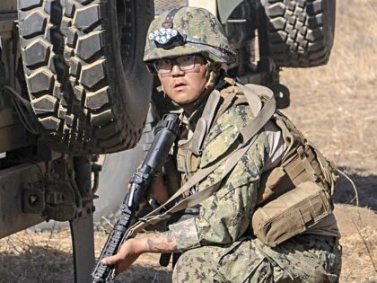Petty Officer 3rd Class Wenheng Zhao during a field training exercise at Fort Hunter Ligge