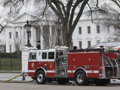 A firetruck is parked outside of the White House in Washington, Dec. 19, 2007. A fake 911