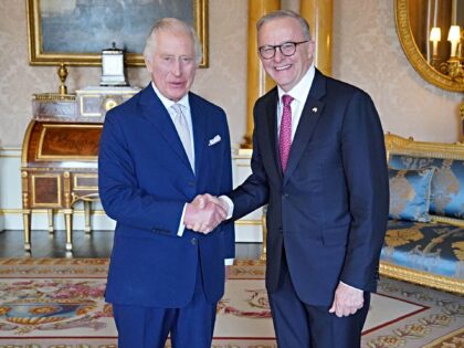 Britain's King Charles III (L) receives Australia's Prime Minister Anthony Albanese during