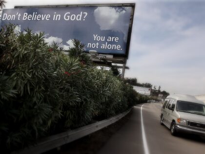 A sign is displayed along Interstate 8 in San Diego, CA by The San Diego Coalition of Reas