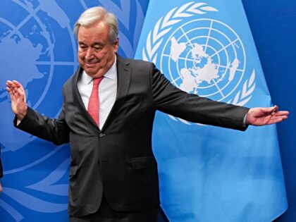 Russian Foreign Minister Sergei Lavrov (L) greets UN Secretary-General Antonio Guterres be