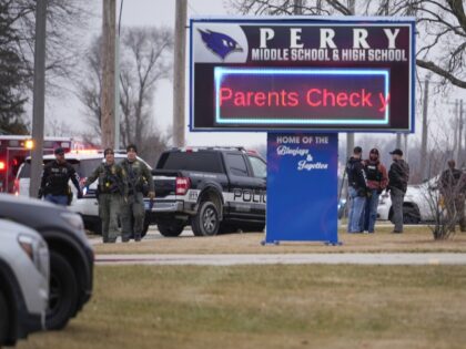 Police respond to Perry High School in Perry, Iowa., Thursday, Jan. 4, 2024. Police say th