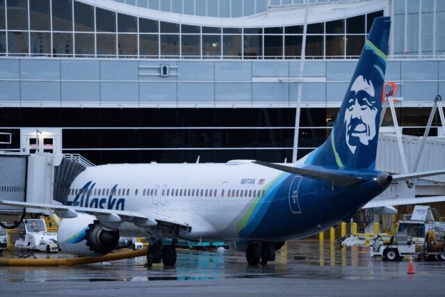 An Alaska Airlines Boeing 737 MAX 9 plane sits at a gate at Seattle-Tacoma International A