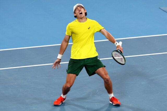 Australia's Alex De Minaur celebrates his victory against Germany's Alexander Zverev at th