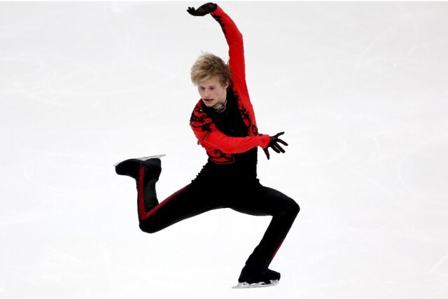 Defending champion Ilia Malinin has a commanding lead after the men's short program at the