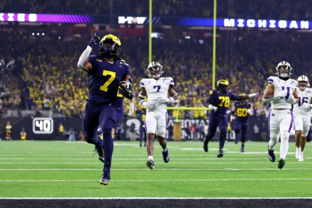 Michigan tramples Washington to clinch US football college crown ...