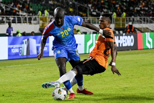 DR Congo goal-scorer Yoane Wissa (L) in action against Zambia at the Africa Cup of Nations