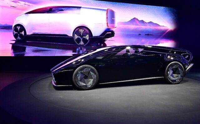 Japanese automaker Honda unveils two new electric vehicle concepts, the Saloon (foreground