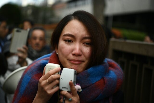Japanese journalist Shiori Ito speaks to reporters outside the Tokyo district court in Dec