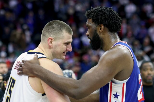 Joel Embiid (right) shares a moment with Nikola Jokic (left) after Philadelphia's victory